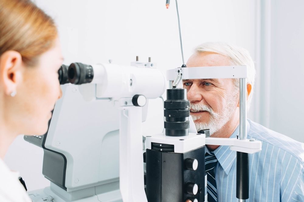 middle aged man undergoing eye test